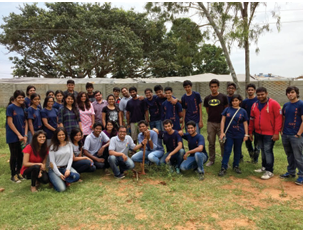 Born to Win and Volunteers helping rejuvenate the environment